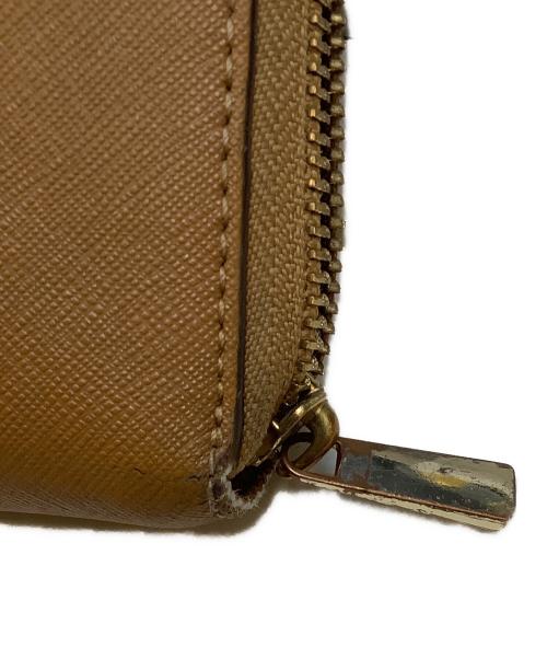 TORY BURCH（トリーバーチ）TORY BURCH (トリーバーチ) ラウンドファスナー財布 ブラウンの古着・服飾アイテム