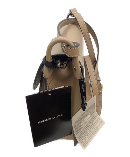 LAURA DI MAGGIO（ローラディマジオ）LAURA DI MAGGIO (ローラディマジオ) タッセルレザーショルダーバッグ ベージュ 未使用品の古着・服飾アイテム