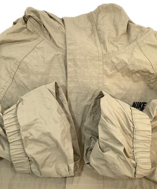 NIKE（ナイキ）NIKE (ナイキ) レインジャケット ベージュ サイズ:Mの古着・服飾アイテム