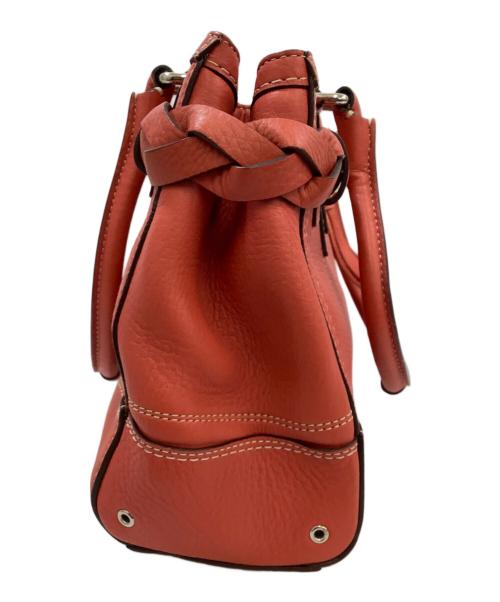 COACH（コーチ）COACH (コーチ) ハンドバッグ オレンジの古着・服飾アイテム