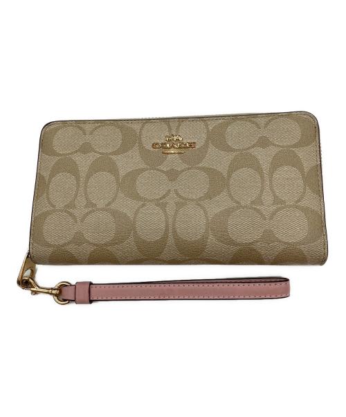 COACH（コーチ）COACH (コーチ) 長財布 ベージュ×ピンクの古着・服飾アイテム