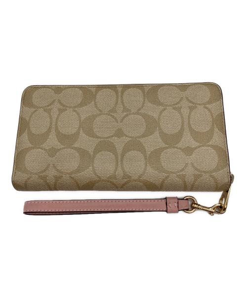 COACH（コーチ）COACH (コーチ) 長財布 ベージュ×ピンクの古着・服飾アイテム