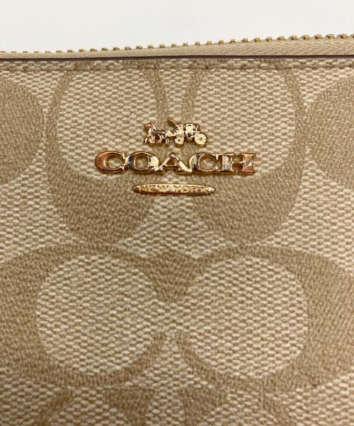 COACH（コーチ）COACH (コーチ) 長財布 ベージュ×ピンクの古着・服飾アイテム