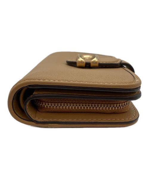 COACH（コーチ）COACH (コーチ) 2つ折り財布 ベージュの古着・服飾アイテム