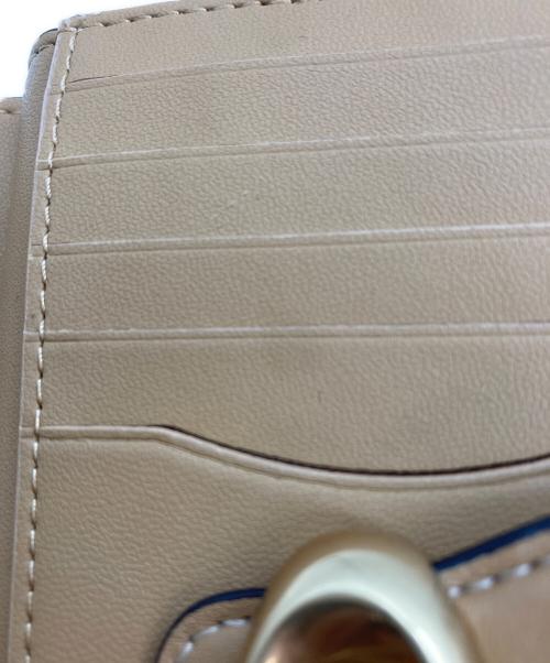 COACH（コーチ）COACH (コーチ) 2つ折り財布 ベージュの古着・服飾アイテム