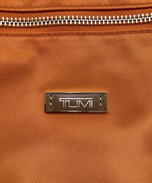 TUMI（トゥミ）TUMI (トゥミ) ショルダーバッグ オレンジの古着・服飾アイテム