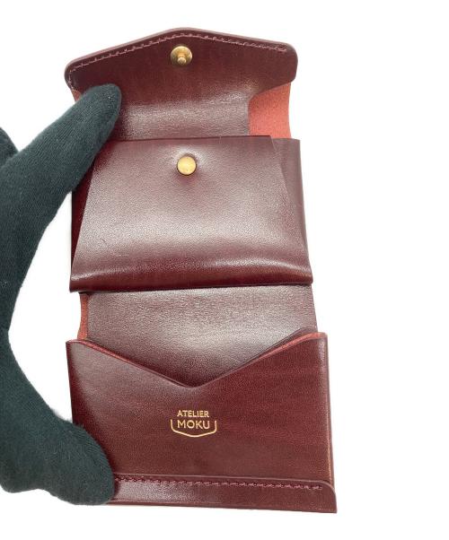ATELIER MOKU（アトリエモク）ATELIER MOKU (アトリエモク) 3つ折り財布 ワインレッドの古着・服飾アイテム