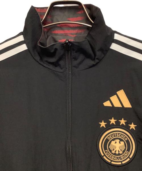 adidas（アディダス）adidas (アディダス) ドイツ代表 (ドイツダイヒョウ) 2022 FIFA ワールドカップ ドイツ代表 リバーシブル アンセムジャケット ブラック サイズ:XLの古着・服飾アイテム