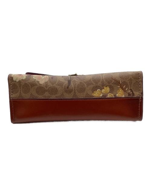 COACH（コーチ）COACH (コーチ) パーカー シグネチャー キャンバス プレーリー フローラル プリントの古着・服飾アイテム