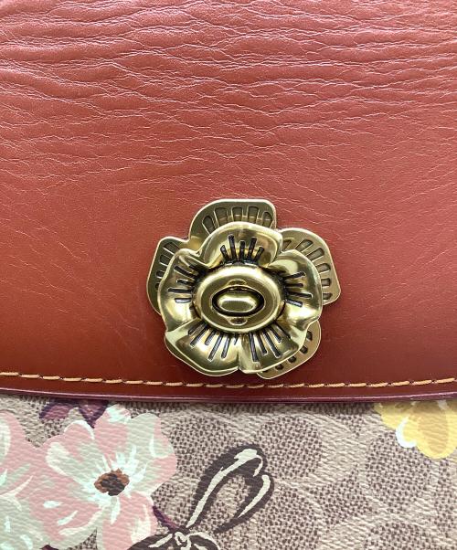 COACH（コーチ）COACH (コーチ) パーカー シグネチャー キャンバス プレーリー フローラル プリントの古着・服飾アイテム