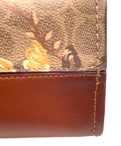 COACH（コーチ）COACH (コーチ) パーカー シグネチャー キャンバス プレーリー フローラル プリントの古着・服飾アイテム