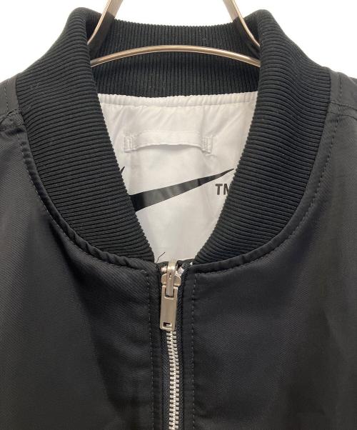 NIKE（ナイキ）NIKE (ナイキ) スウォッシュボンバージャケット ブラック×ホワイト サイズ:Lの古着・服飾アイテム