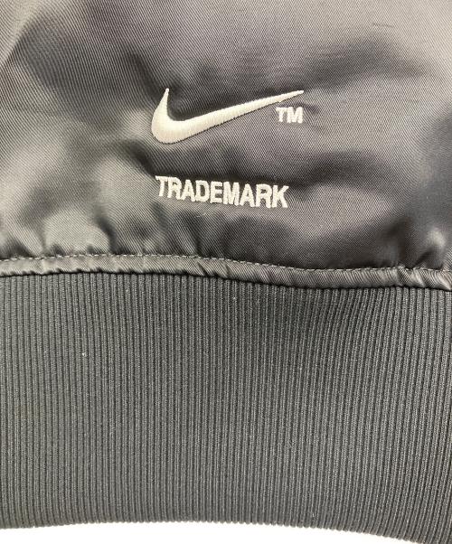 NIKE（ナイキ）NIKE (ナイキ) スウォッシュボンバージャケット ブラック×ホワイト サイズ:Lの古着・服飾アイテム
