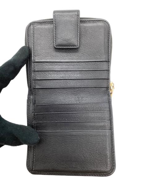 Saint Laurent Paris（サンローランパリ）Saint Laurent Paris (サンローランパリ) 2つ折り財布 ブラックの古着・服飾アイテム