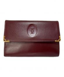 Cartier（カルティエ）の古着「3つ折り財布」｜ボルドー