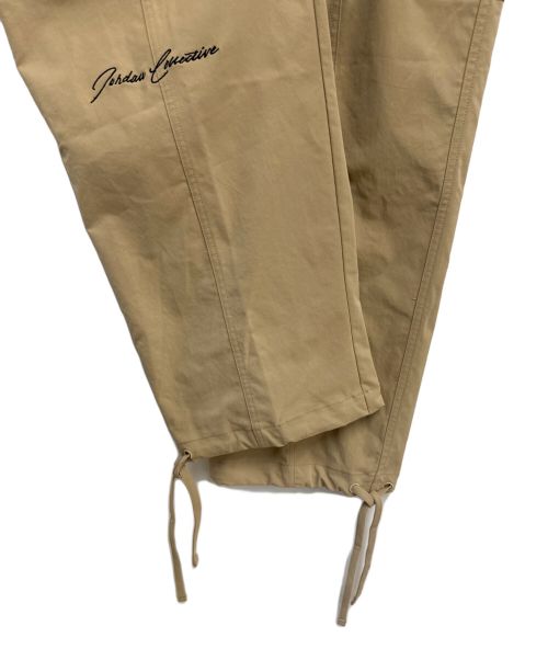 NIKE（ナイキ）NIKE (ナイキ) カーゴパンツ ベージュ サイズ:L 未使用品の古着・服飾アイテム