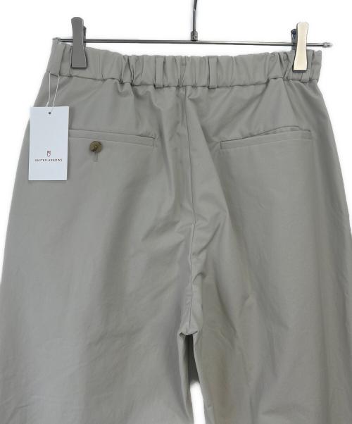 UNITED ARROWS（ユナイテッドアローズ）UNITED ARROWS (ユナイテッドアローズ) トロピカル クリース テーパード 2プリーツ パンツ ベージュ サイズ:S 未使用品の古着・服飾アイテム
