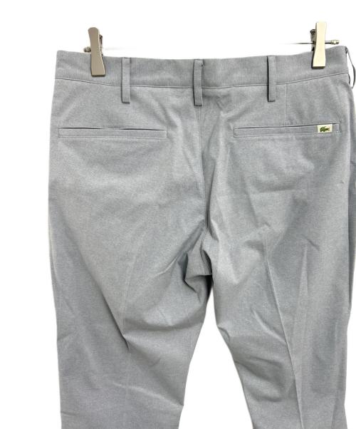 LACOSTE（ラコステ）LACOSTE (ラコステ) オックスフォードセンタークリーススラックス グレー サイズ:42 未使用品の古着・服飾アイテム