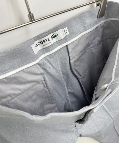 LACOSTE（ラコステ）LACOSTE (ラコステ) オックスフォードセンタークリーススラックス グレー サイズ:42 未使用品の古着・服飾アイテム