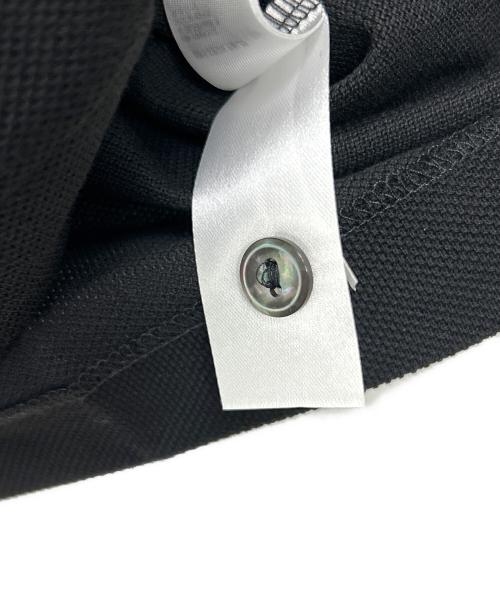 LACOSTE（ラコステ）LACOSTE (ラコステ) ポロシャツ ブラック×ホワイト サイズ:3 未使用品の古着・服飾アイテム