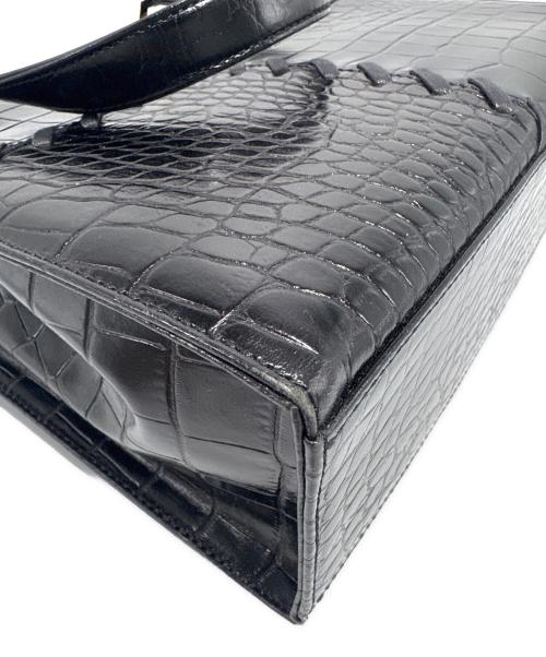 Yves Saint Laurent（イヴサンローラン）Yves Saint Laurent (イヴサンローラン) クロコ型押しハンドバッグ ブラックの古着・服飾アイテム