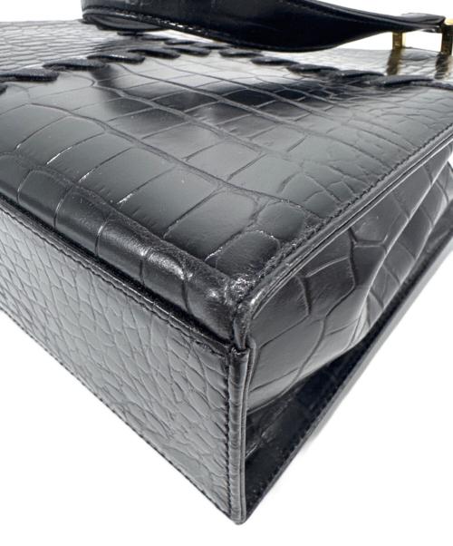 Yves Saint Laurent（イヴサンローラン）Yves Saint Laurent (イヴサンローラン) クロコ型押しハンドバッグ ブラックの古着・服飾アイテム
