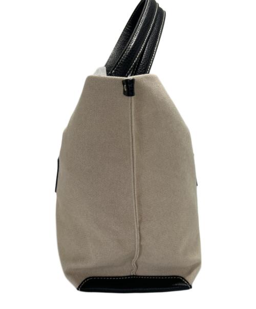 IACUCCI（イアクッチ）IACUCCI (イアクッチ) キャンバスバッグ ブラック×アイボリーの古着・服飾アイテム