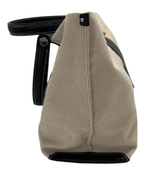 IACUCCI（イアクッチ）IACUCCI (イアクッチ) キャンバスバッグ ブラック×アイボリーの古着・服飾アイテム