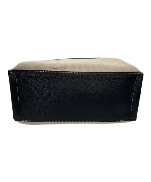 IACUCCI（イアクッチ）IACUCCI (イアクッチ) キャンバスバッグ ブラック×アイボリーの古着・服飾アイテム