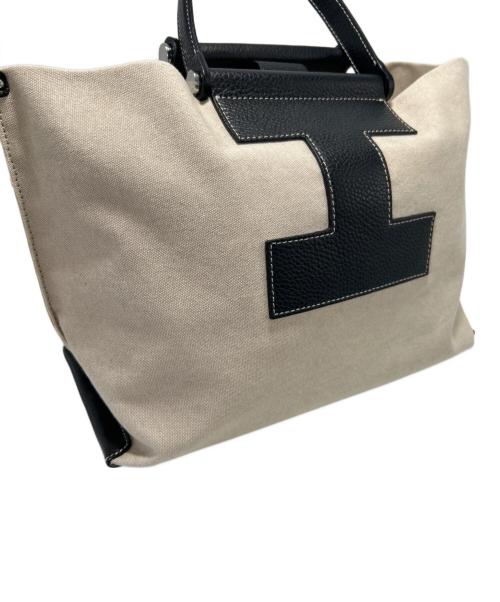 IACUCCI（イアクッチ）IACUCCI (イアクッチ) キャンバスバッグ ブラック×アイボリーの古着・服飾アイテム