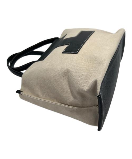 IACUCCI（イアクッチ）IACUCCI (イアクッチ) キャンバスバッグ ブラック×アイボリーの古着・服飾アイテム