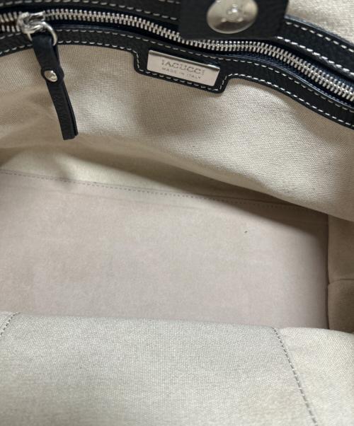 IACUCCI（イアクッチ）IACUCCI (イアクッチ) キャンバスバッグ ブラック×アイボリーの古着・服飾アイテム