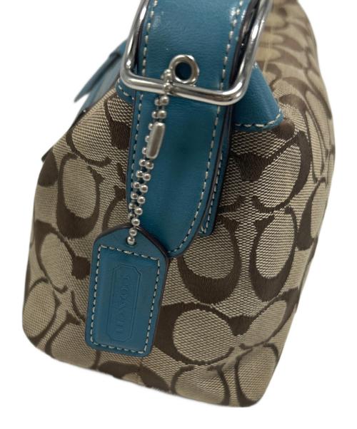 COACH（コーチ）COACH (コーチ) アクセサリーポーチ ベージュ×ブルーの古着・服飾アイテム