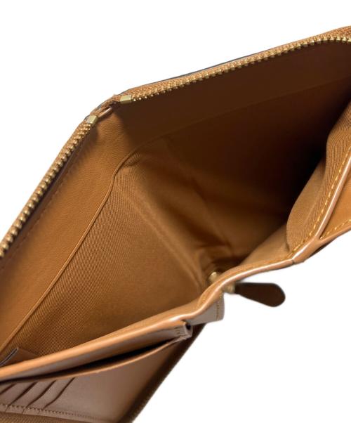 COACH（コーチ）COACH (コーチ) 刺繍ラウンドファスナー財布 ブラウン系の古着・服飾アイテム