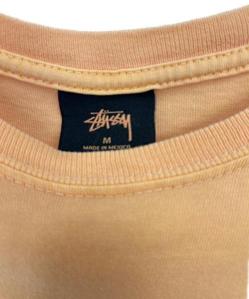 stussy（ステューシー）stussy (ステューシー) 半袖カットソー オレンジ サイズ:Mの古着・服飾アイテム