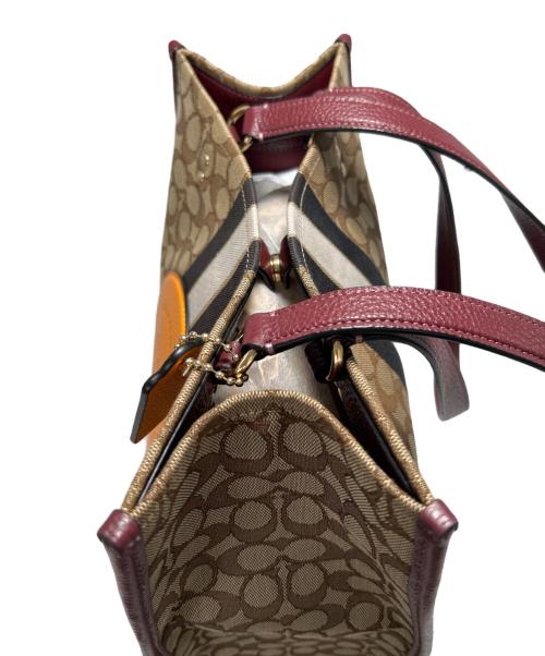 COACH（コーチ）COACH (コーチ) デンプシー トートバッグ ベージュの古着・服飾アイテム