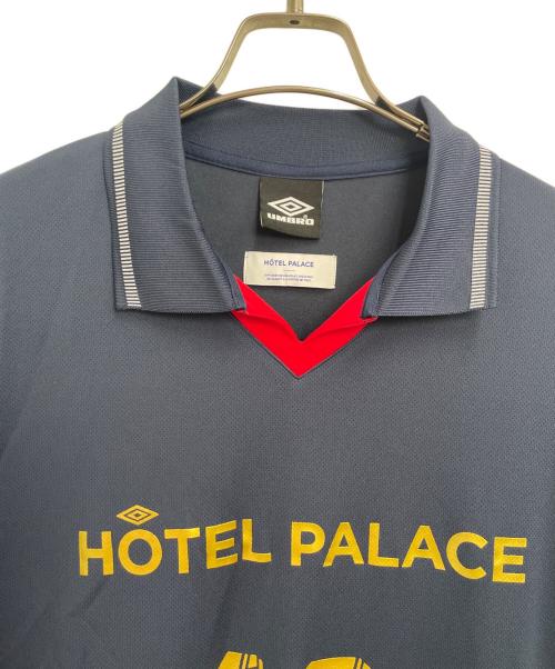 UMBRO（アンブロ）UMBRO (アンブロ) hotel palace (ホテルプレイス) ゲームシャツ ネイビー サイズ:Lの古着・服飾アイテム