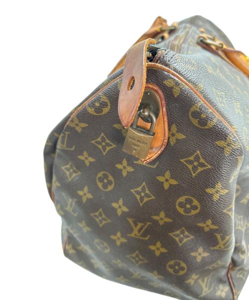LOUIS VUITTON（ルイ ヴィトン）LOUIS VUITTON (ルイ ヴィトン) トラベルバッグ ブラウンの古着・服飾アイテム