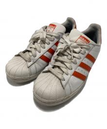 adidas（アディダス）の古着「ローカットスニーカー」｜ホワイト×オレンジ