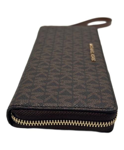 MICHAEL KORS（マイケル・コース）MICHAEL KORS (マイケル・コース) ラウンドファスナー財布 ブラウンの古着・服飾アイテム