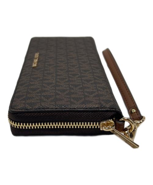 MICHAEL KORS（マイケル・コース）MICHAEL KORS (マイケル・コース) ラウンドファスナー財布 ブラウンの古着・服飾アイテム