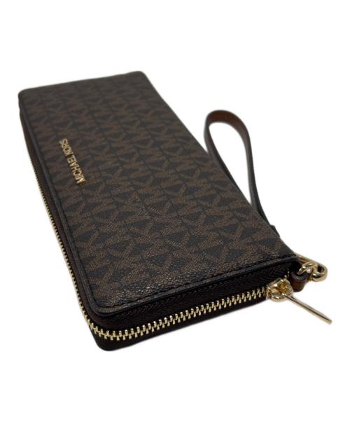 MICHAEL KORS（マイケル・コース）MICHAEL KORS (マイケル・コース) ラウンドファスナー財布 ブラウンの古着・服飾アイテム