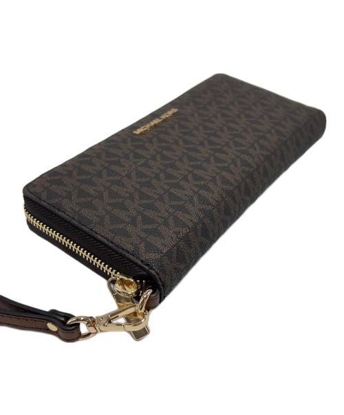 MICHAEL KORS（マイケル・コース）MICHAEL KORS (マイケル・コース) ラウンドファスナー財布 ブラウンの古着・服飾アイテム