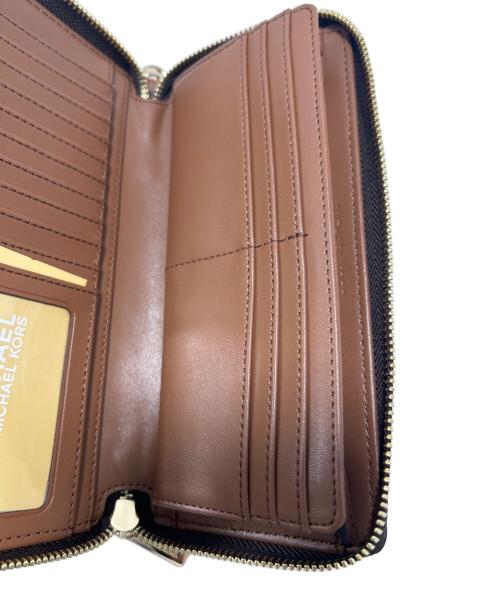 MICHAEL KORS（マイケル・コース）MICHAEL KORS (マイケル・コース) ラウンドファスナー財布 ブラウンの古着・服飾アイテム