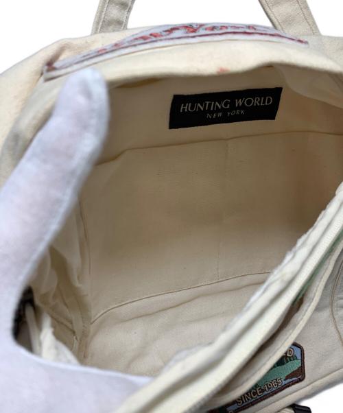 HUNTING WORLD（ハンティングワールド）HUNTING WORLD (ハンティングワールド) ワッペンデニムショルダーバッグ アイボリーの古着・服飾アイテム
