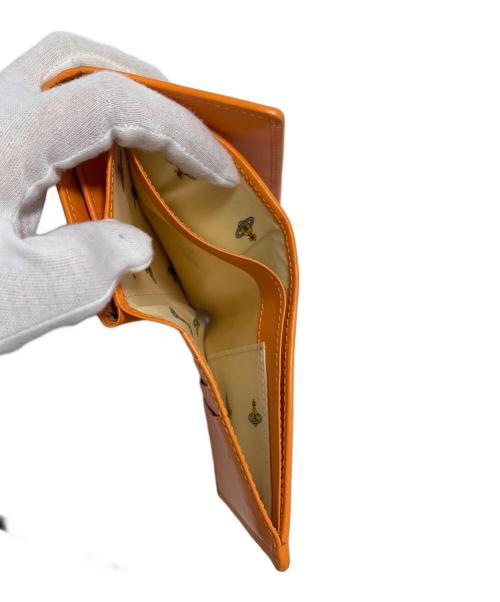 Vivienne Westwood（ヴィヴィアンウエストウッド）Vivienne Westwood (ヴィヴィアンウエストウッド) 財布 オレンジの古着・服飾アイテム