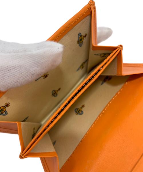 Vivienne Westwood（ヴィヴィアンウエストウッド）Vivienne Westwood (ヴィヴィアンウエストウッド) 財布 オレンジの古着・服飾アイテム