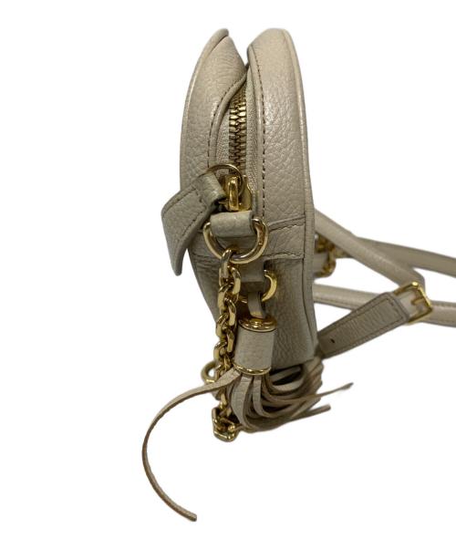 MCM（エムシーエム）MCM (エムシーエム) タッセルチャーム付ショルダーバッグ ベージュの古着・服飾アイテム