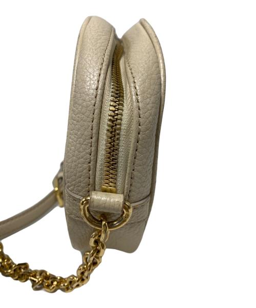 MCM（エムシーエム）MCM (エムシーエム) タッセルチャーム付ショルダーバッグ ベージュの古着・服飾アイテム