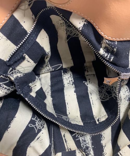 Vivienne Westwood（ヴィヴィアンウエストウッド）Vivienne Westwood (ヴィヴィアンウエストウッド) ハンドバッグ レッド×ベージュの古着・服飾アイテム